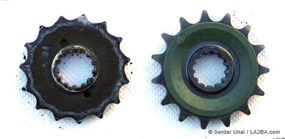 Worn out front countershaft sprocket next to new