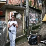 Dangling a Leica from your wrist in the middle of a favela can be safer than you think with the right company. (Rocinha, Rio, Brazil)