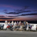 Buena Vista Social Club gathers on the evenings to appreciate beautiful women walking by while chatting about bikes. (Salvador, Brazil)
